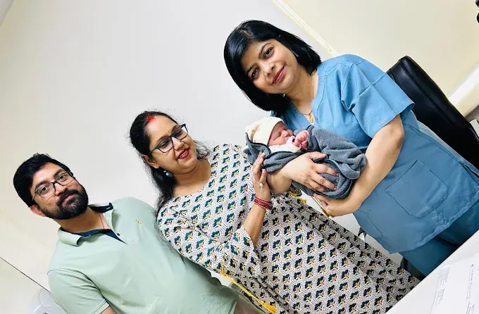 Dr. Bhavya Rathore with a family and their baby